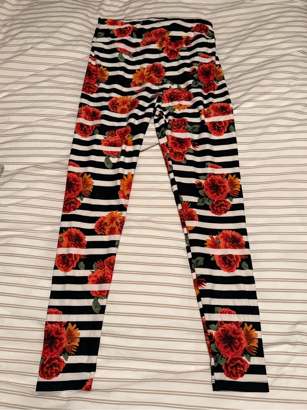 LuLaRoe Black & White Striped Leggings with Red Floral Print